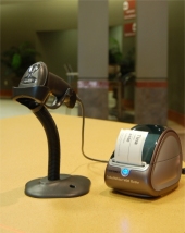 child check in system with scanner and name badge printer